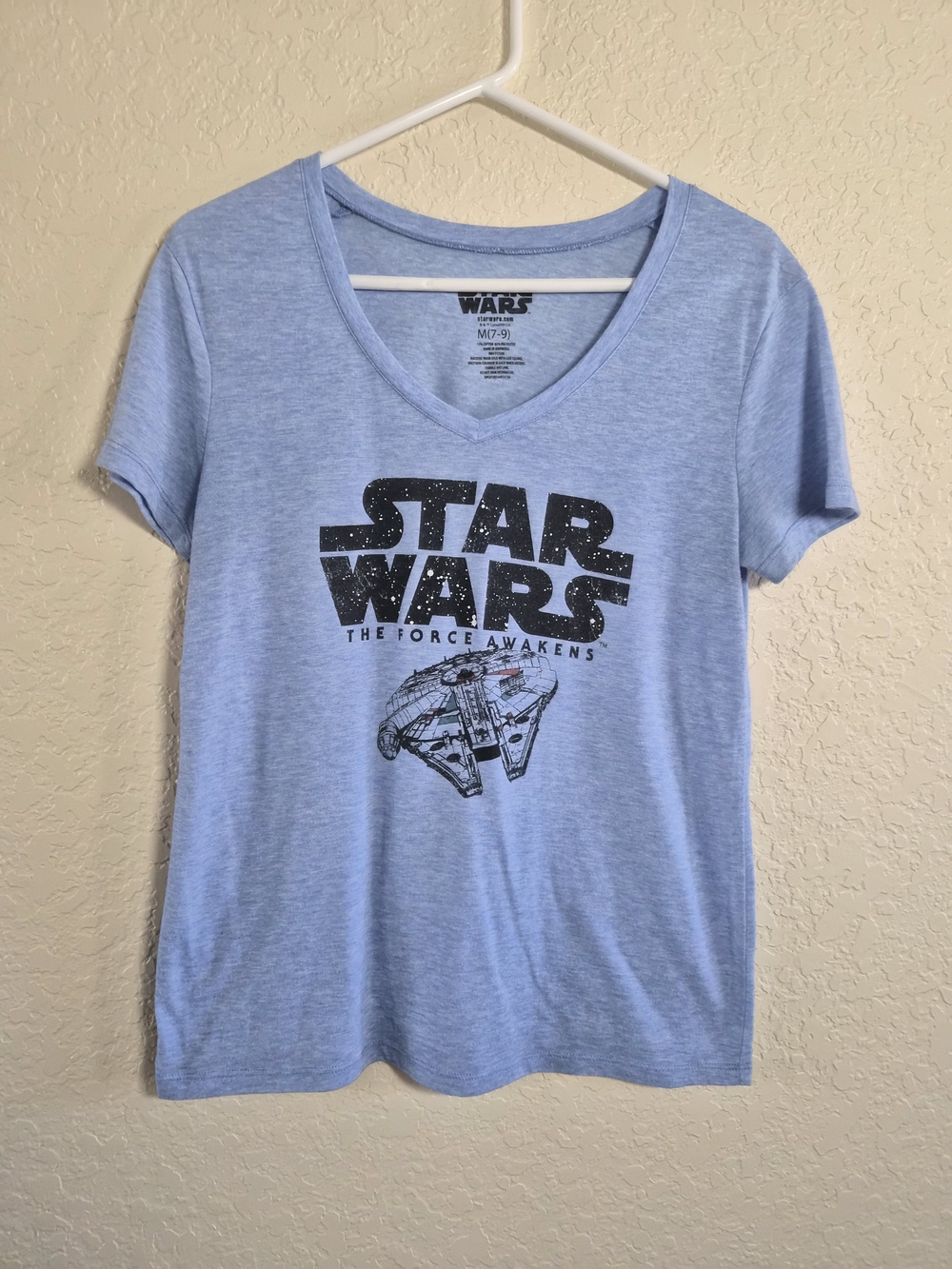 Star Wars Women's V-Neck Tee in Light Blue with Millennium Falcon Graphic